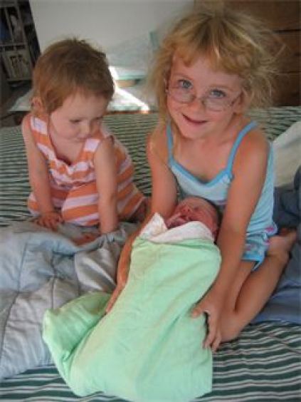 siblings with newborn baby homebirth midwife Santa Cruz